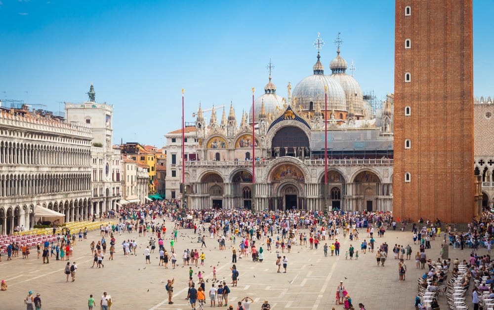 Piazza San Marco with the Basilica of Saint Mark and the bell tower of St Mark's Campanile (Campanile di San Marco) in Venice, Italy,
