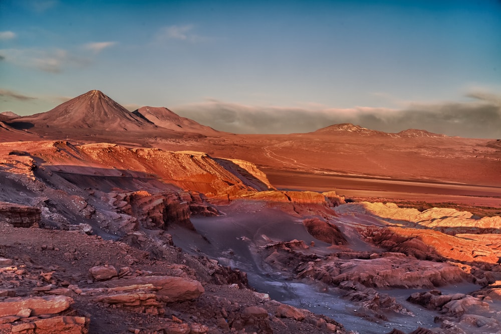 Sunset in front of the volcano and the salt desert, Chile