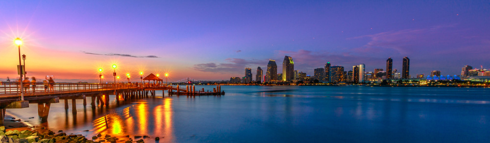 Panorama of Coronado old pier reflecting on in San Diego Bay from Coronado Island, California