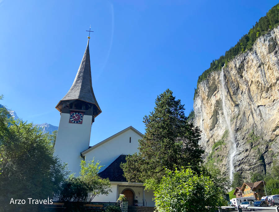 Church with waterfalls in Lauterbrunnen