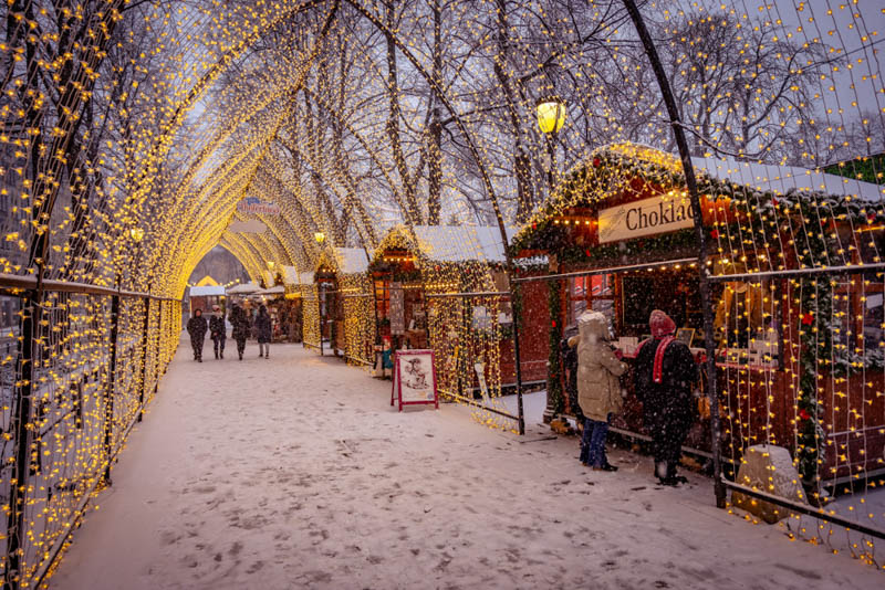 Traditional Christmas market with falling snow